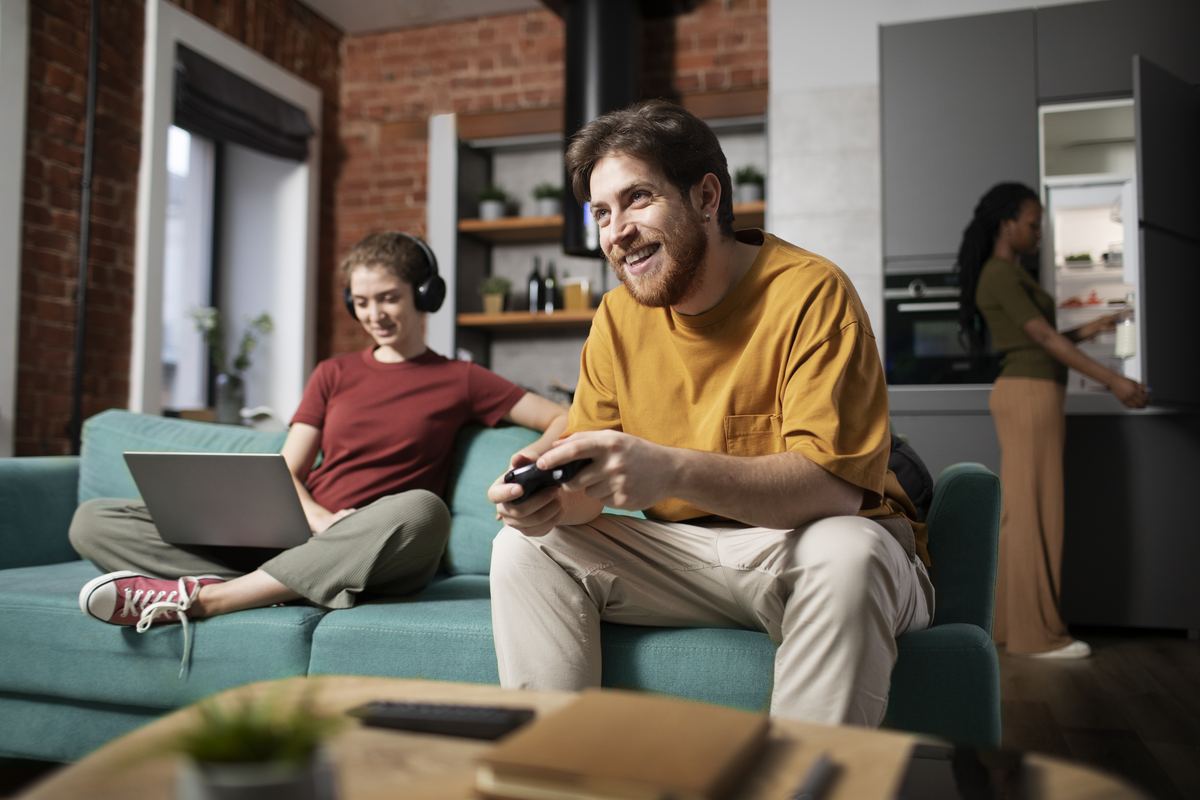 Roommates gaming and browsing together on fast home internet